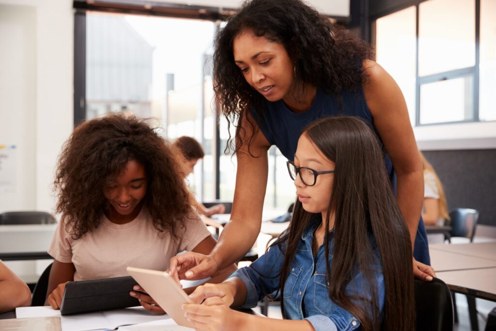 Teacher with her students