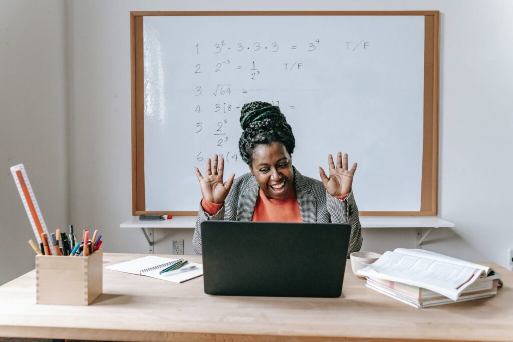 Teacher in front of her laptop